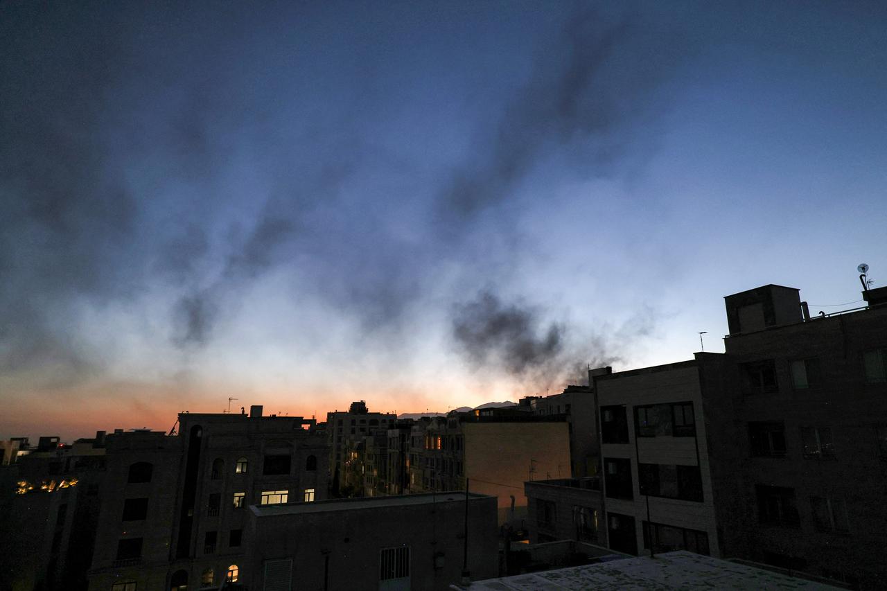 Smoke plumes billow following an overnight Israeli strike on Tehran on June 17, 2025. (AFP Photo)