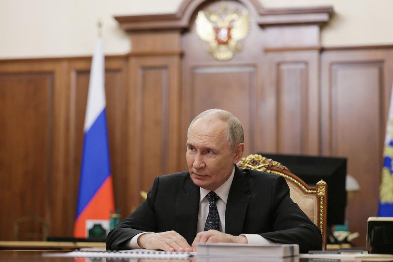 In this pool photograph distributed by Russian state agency Sputnik, Putin attends a meeting with Russias state-owned defence corporation Rostec CEO in Moscow, Russia on June 17, 2025. (AFP Photo)