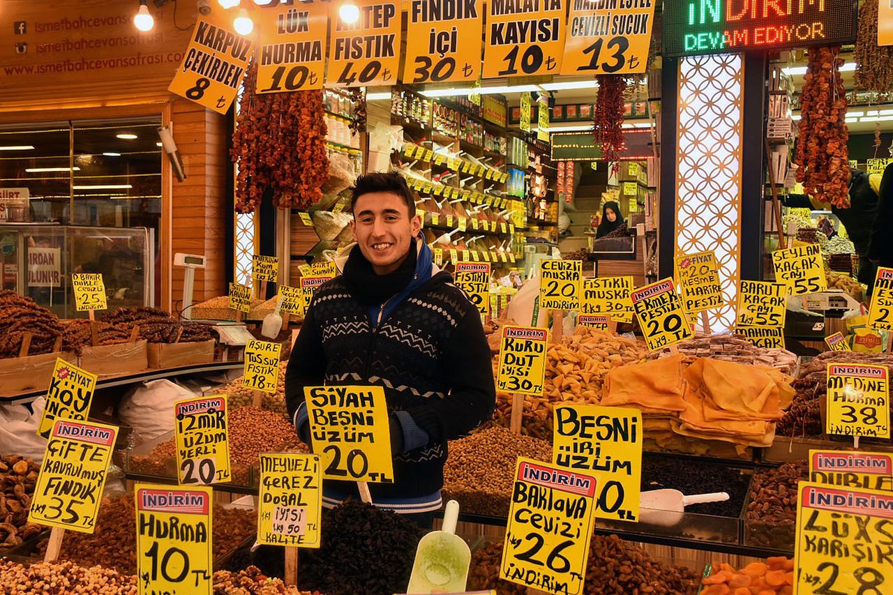 A young man selling dried fruits and nuts at the Women's Bazaar in Fatih, Istanbul, March 1, 2019. (Photo via fototrek.com)