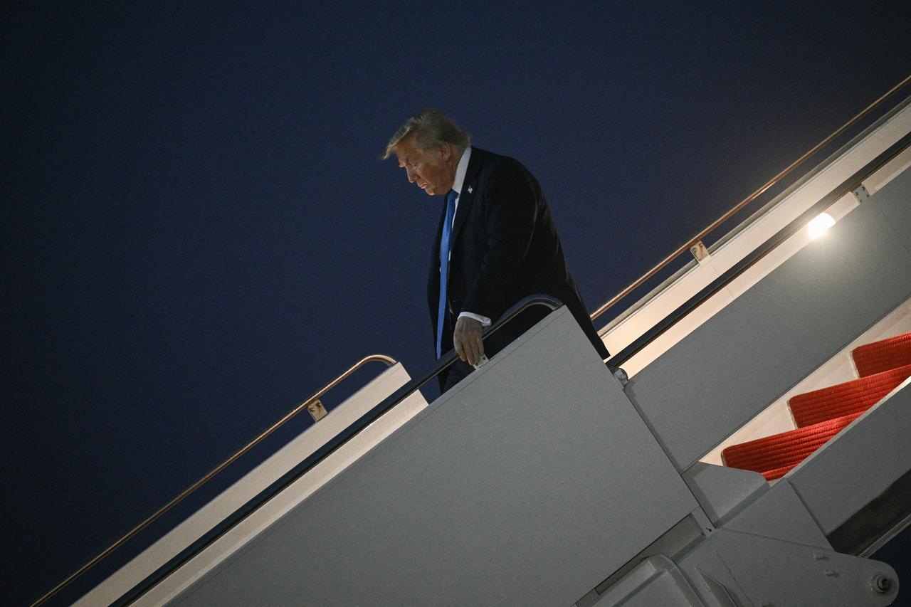 US President Donald Trump steps off Air Force One upon return to Joint Base Andrews in Maryland on June 17, 2025. (AFP Photo)