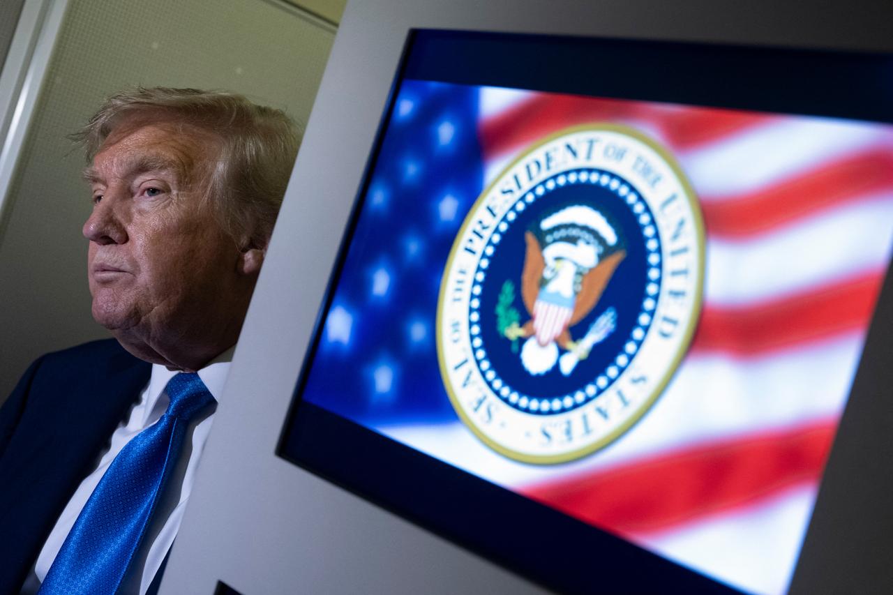 US President Donald Trump speaks to reporters about the G7 Summit aboard Air Force One while travelling back to Washington from Canada on June 16, 2025. (AFP Photo)