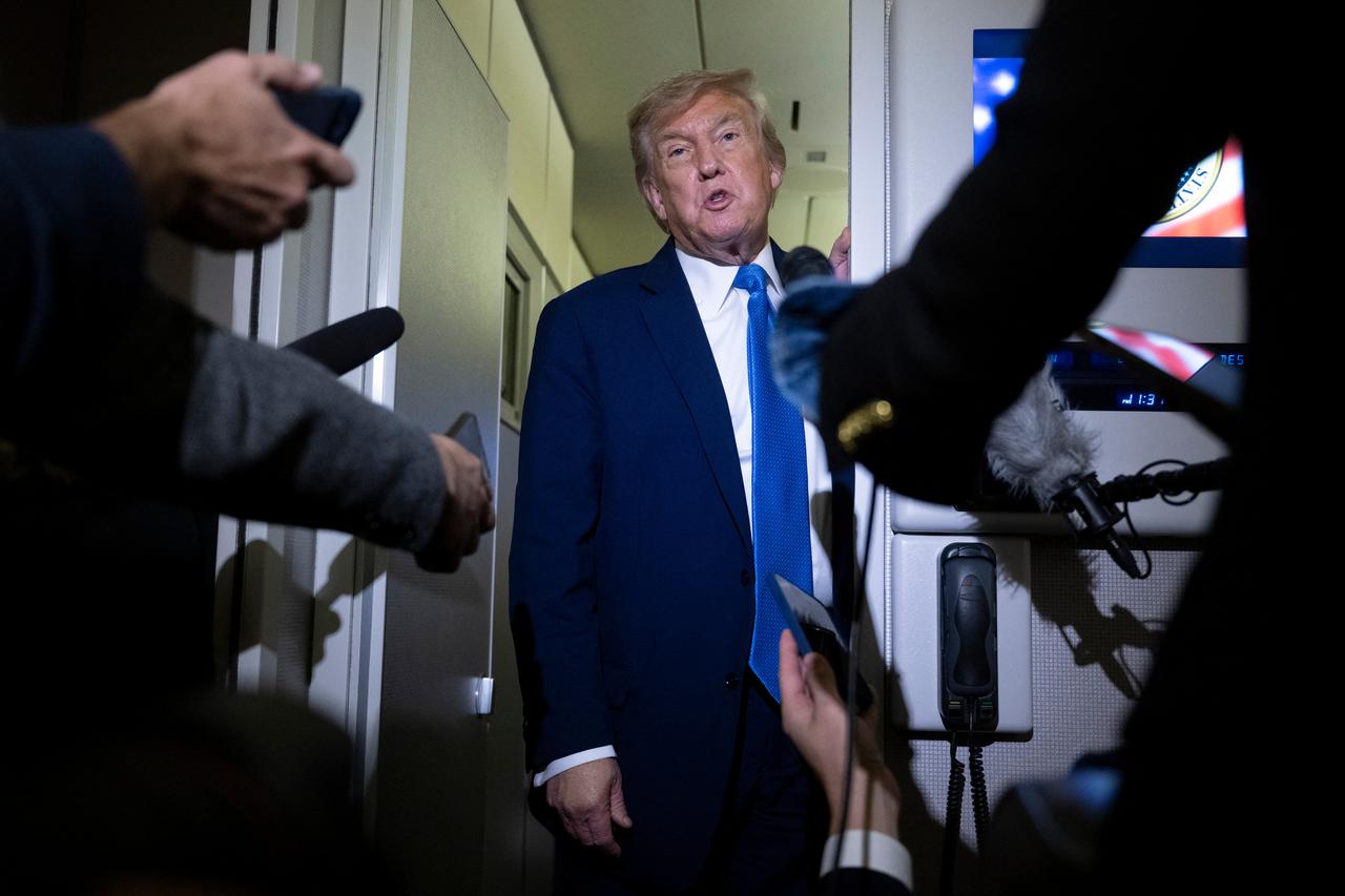 US President Donald Trump speaks to reporters about the G7 Summit aboard Air Force One while travelling back to Washington from Canada on June 16, 2025. (AFP Photo)