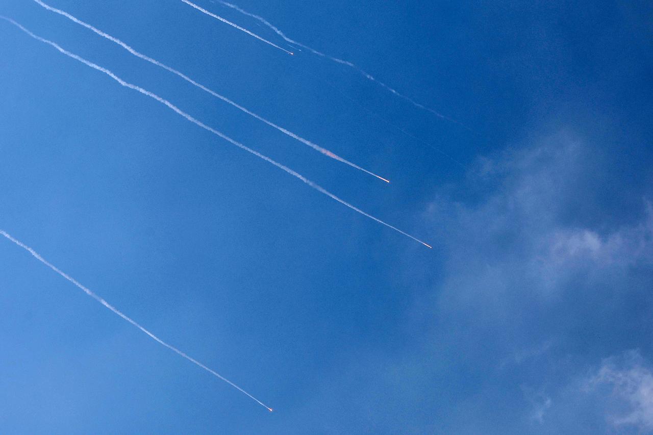 Rocket trails are seen in the sky above the Israeli coastal city of Netanya amid a fresh barrage of Iranian missiles on June 17, 2025. (AFP Photo)