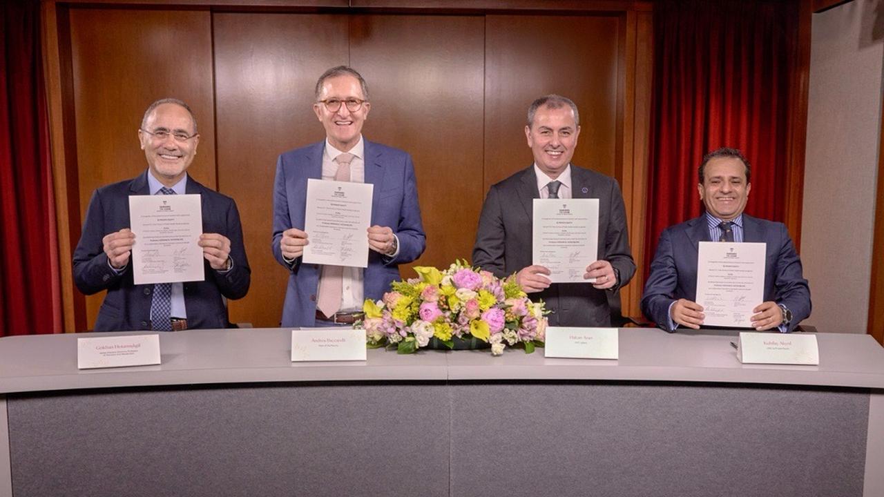 (R-L) Prof. Gokhan Hotamisligil, Harvard T.H. Chan School of Public Health Dean Andrea Baccarelli, Isbank CEO Hakan Aran, and Is Private Equity CEO Kubilay Aykol hold signed agreements marking the launch of Türkiye-based biotech venture Enlila at a ceremony in Boston, US, on June 16, 2025. (Photo via businesswire.com)