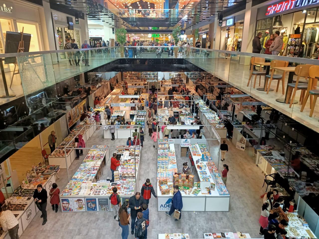 Visitors browse through book and toy stands at a temporary market set up inside Prestige Mall in Istanbul, Türkiye, accessed on June 17, 2025. (Photo via prestigemall.com.tr)
