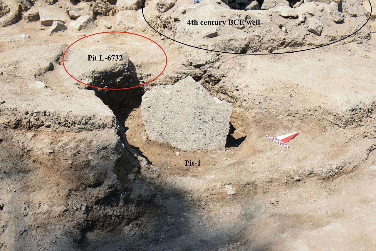 Standing stone in Pit 1, Pit L-6732, and a 4th-century BC well at Liman Tepe, Izmir, Türkiye, February 2025. (Photo via Cambridge Archaeological Journal)