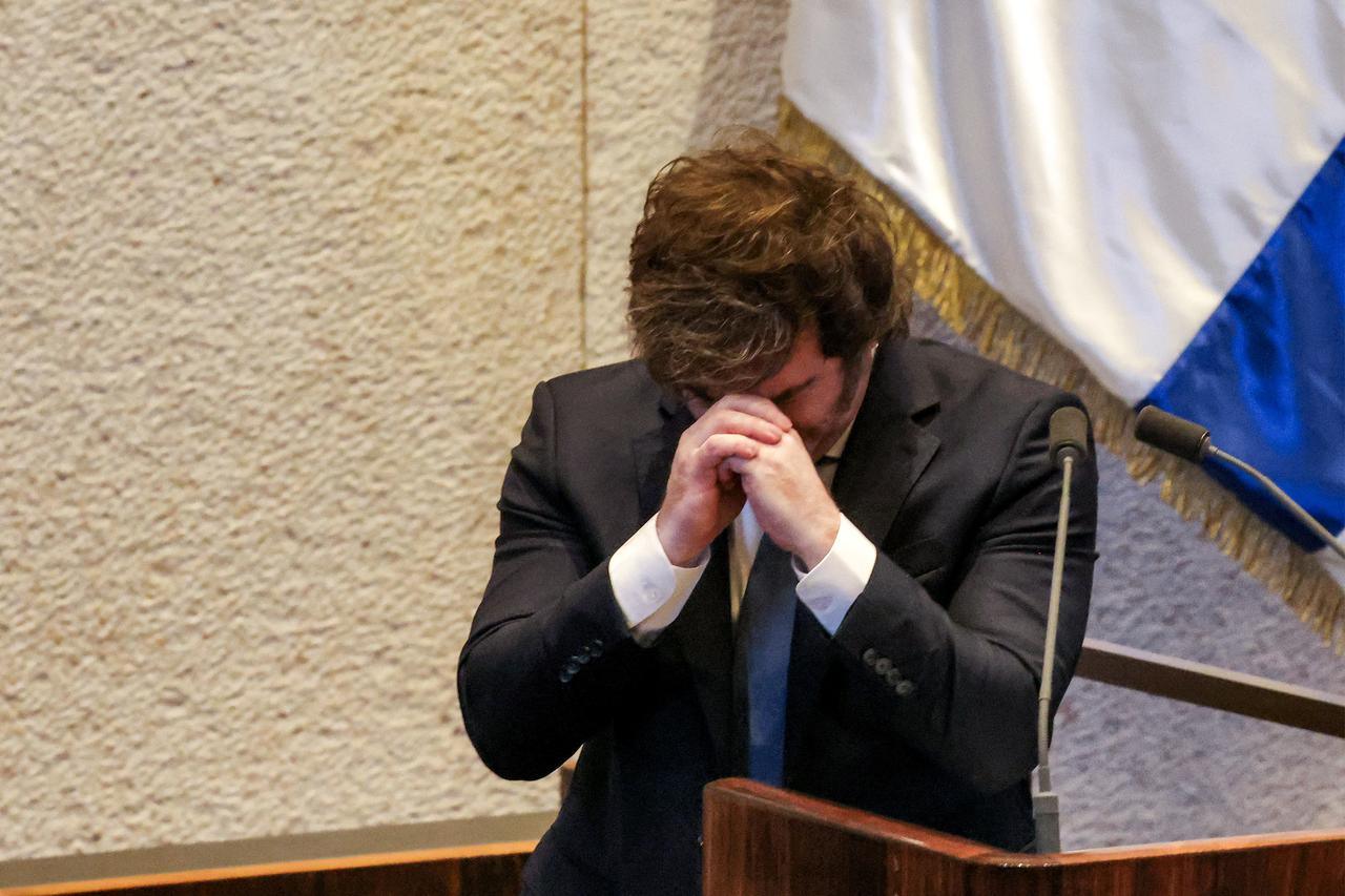 Argentinas President Javier Milei reacts as he addresses the assembly during a session of the Israeli parliament (Knesset) at its headquarters in Jerusalem on June 11, 2025. (AFP Photo)