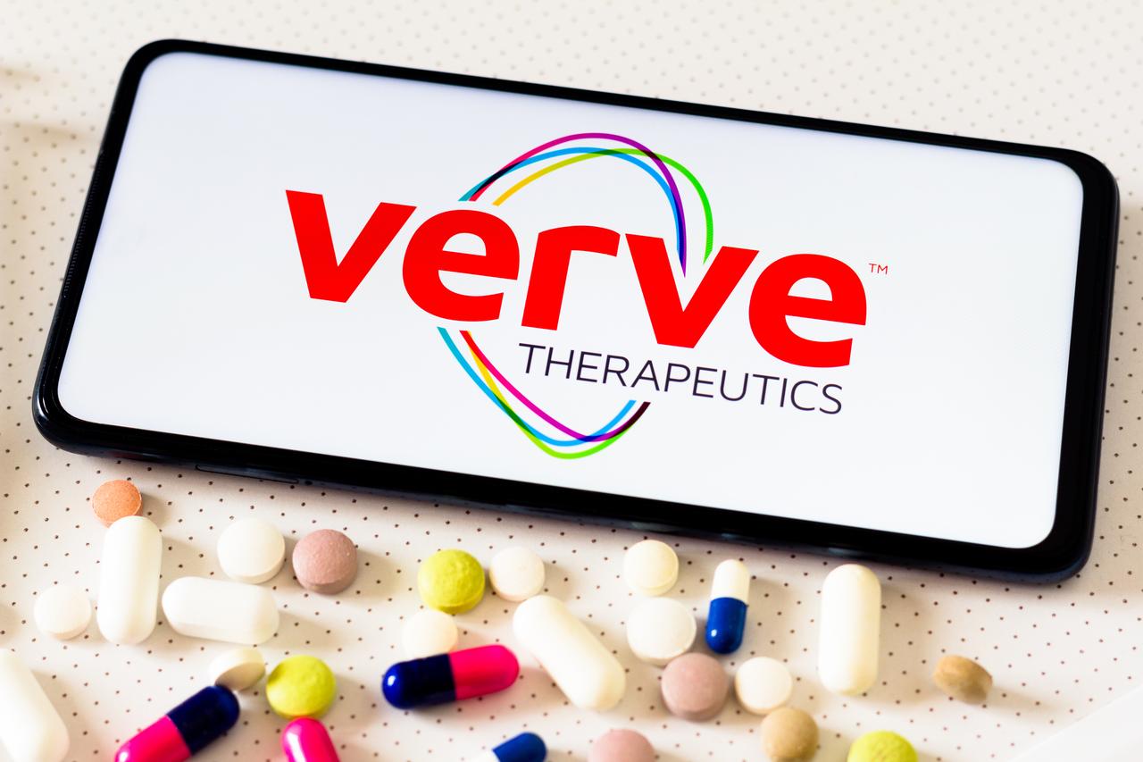 Verve Therapeutics logo displayed on a smartphone screen next to various pills, pictured in Brazil on March 15, 2022. (Adobe Stock Photo)