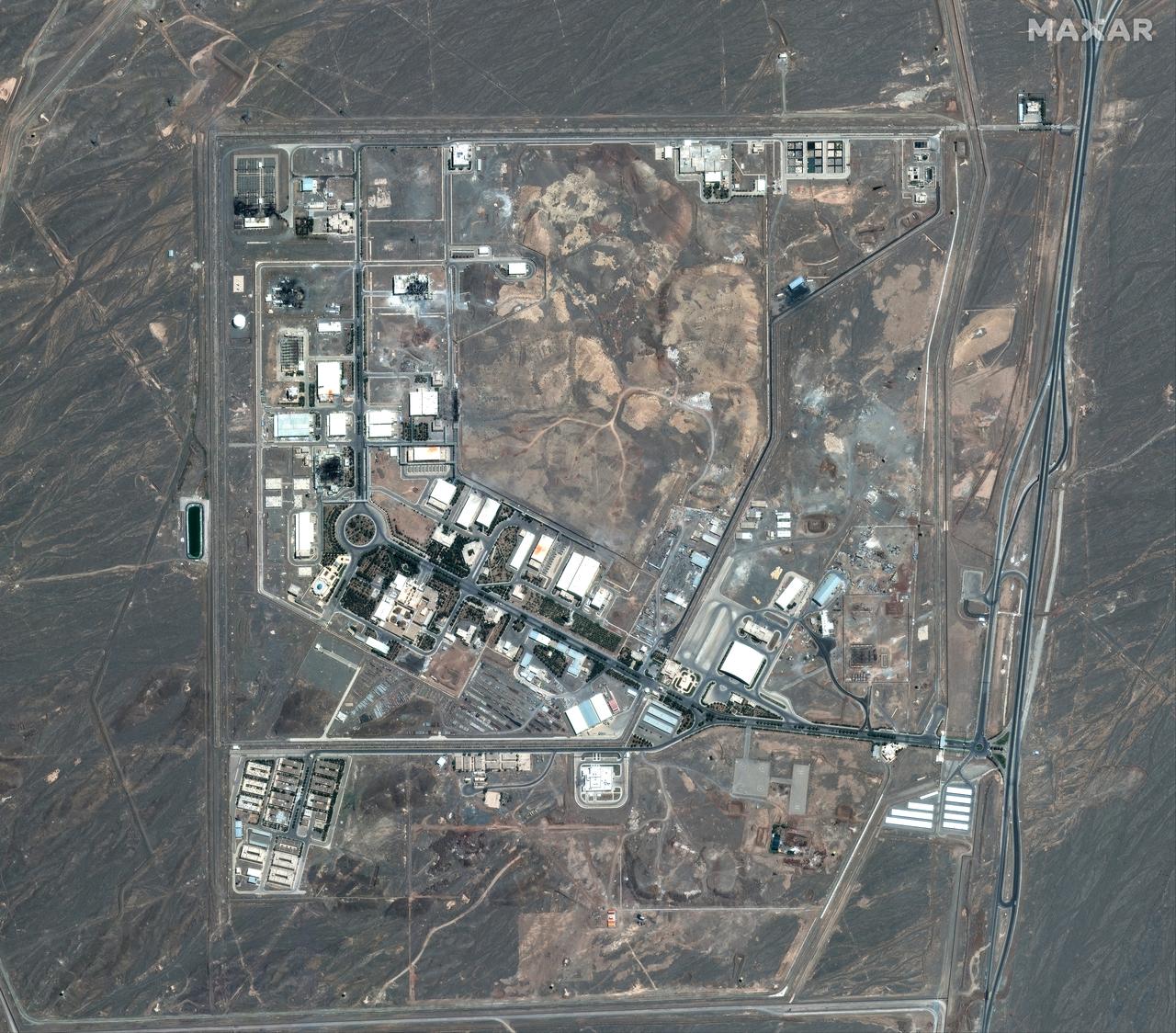 This handout satellite image released by Maxar Technologies on June 15, 2025, shows the Natanz nuclear facilities (Shahid Ahmadi Roshan Nuclear Facilities), near Ahmadabad, Iran after airstrikes on June 15, 2025. (Photo by Handout / Satellite image ©2025 Maxar Technologies / AFP)