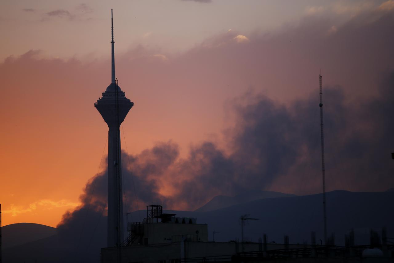 Smoke rises from the area where Israeli forces struck the Iranian state television building in Tehran, Iran on June 16, 2025. (AA Photo)