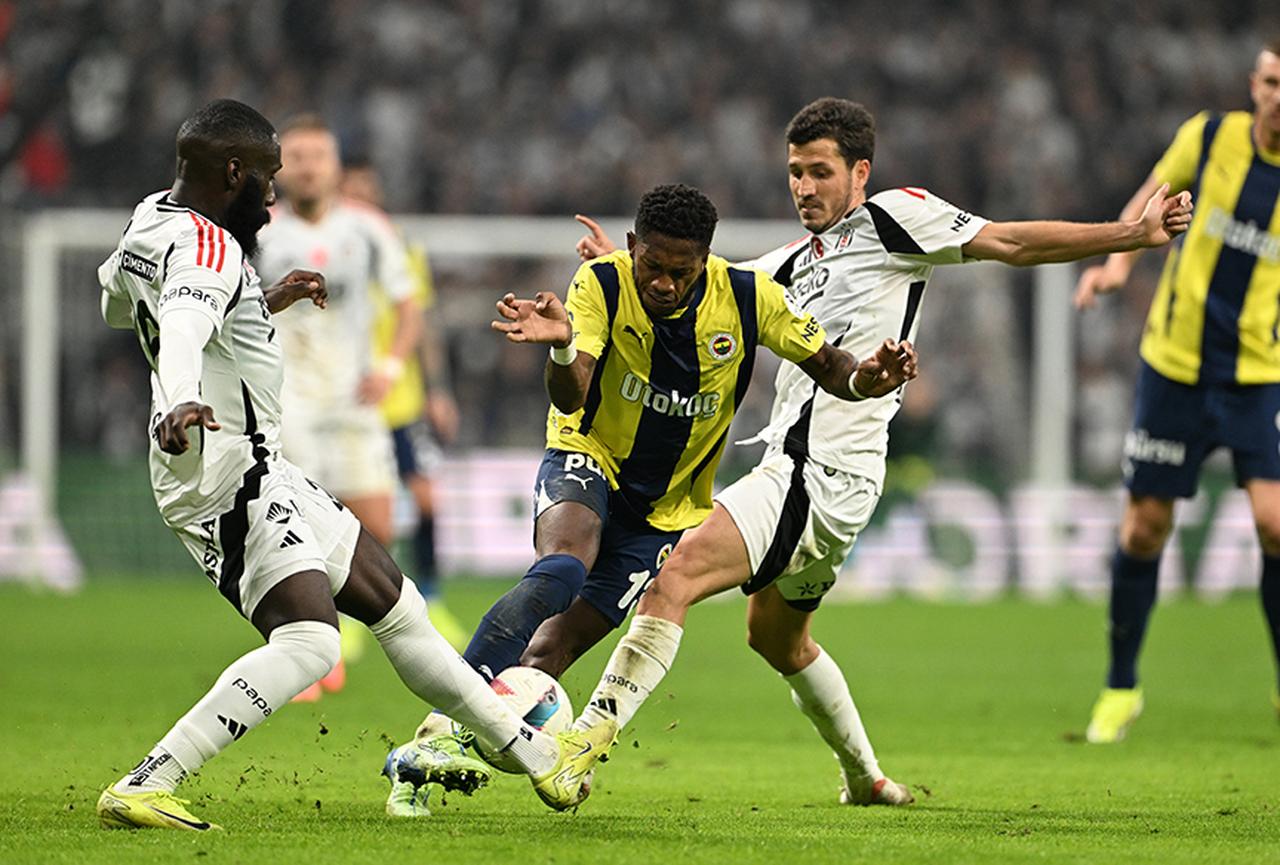 During a match between Fenerbahce and Besiktas in the Trendyol Super League on December 7, 2024. In the middle Fred (Fenerbahce), right Salih Ucan (Besiktas), left Arthur Masuaku (Besiktas). (AA Photo)