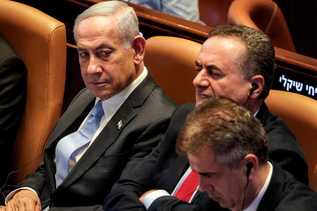 Israels (L to R) Prime Minister Benjamin Netanyahu, Defence Minister Israel Katz, and Energy and Infrastructure Minister Eli Cohen attend the address of Argentinas President to a session of the Israeli parliament (Knesset) at its headquarters in Jerusalem on June 11, 2025. (AFP Photo)