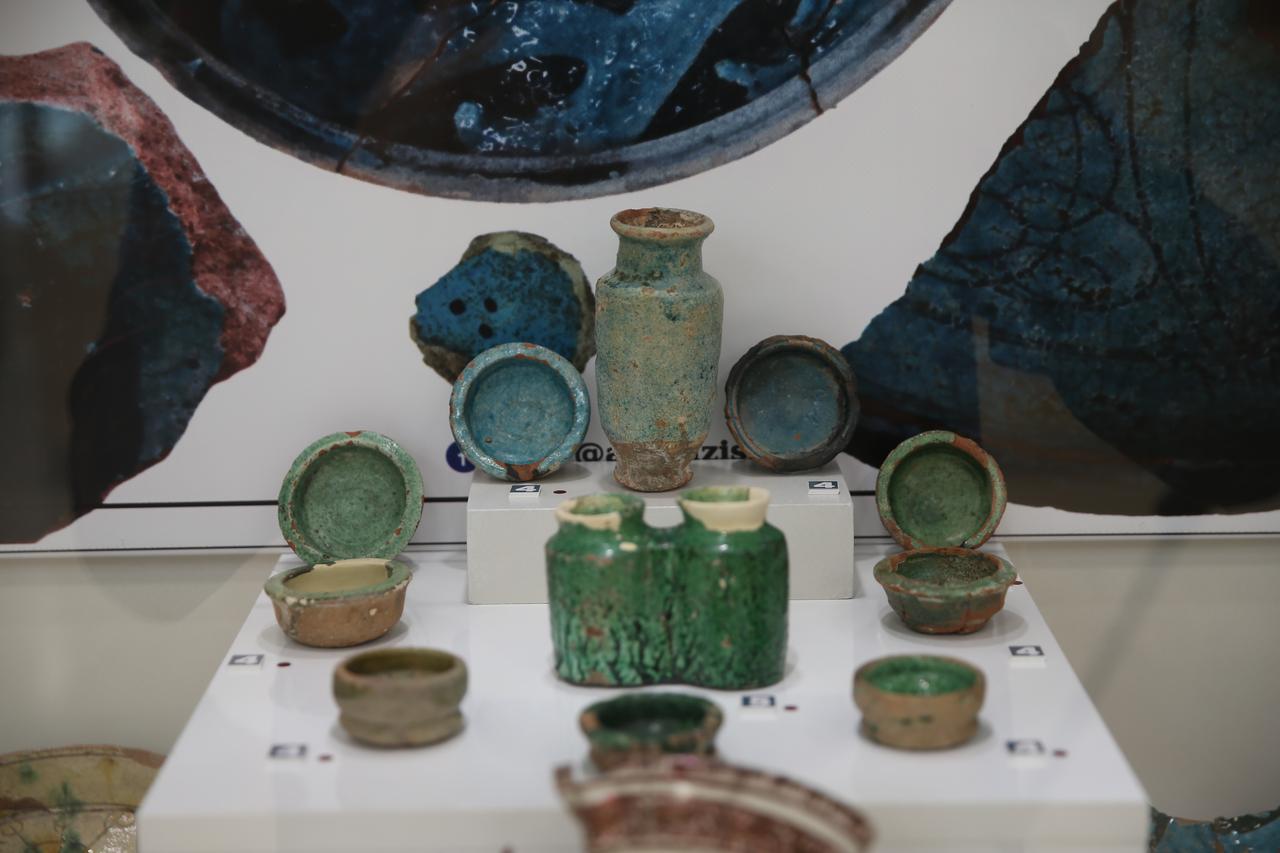 Glazed ceramics featuring various figures, unearthed during excavations at the Ani archaeological site—listed as a UNESCO World Heritage Site in Kars, Türkiye—are on display, June 18, 2025. (AA Photo)