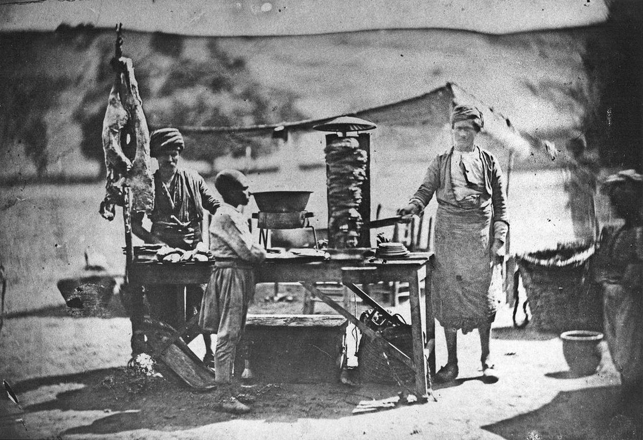 The earliest known photo of doner kebab (meat cooked on a vertical rotisserie), 1855, Ottoman Empire. (Photo via James Robertson)