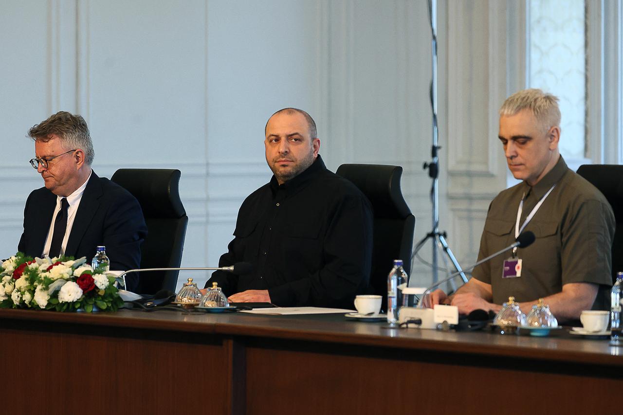 Head of the Ukrainian delegation and Ukraines Defence Minister Rustem Umierov (C) sits with delegatiom members as they attend a second meeting of Ukrainian and Russian delegation direct talks, at the Ciragan Palace, in Istanbul, on June 2, 2025. Ukrainian and Russian delegations have begun a second round of peace talks in Istanbul, where they are set to exchange plans for how they want to end the three-year war. (Photo by Adem ALTAN / AFP)