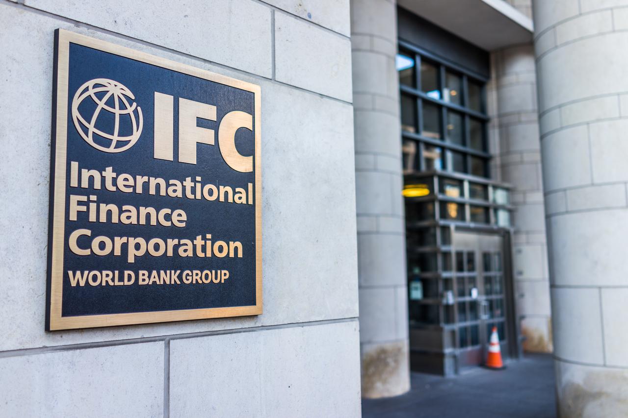 The sign of the International Finance Corporation (IFC), a member of the World Bank Group, seen at the entrance of its headquarters in Washington, DC, on March 4, 2017. (Adobe Stock Photo)