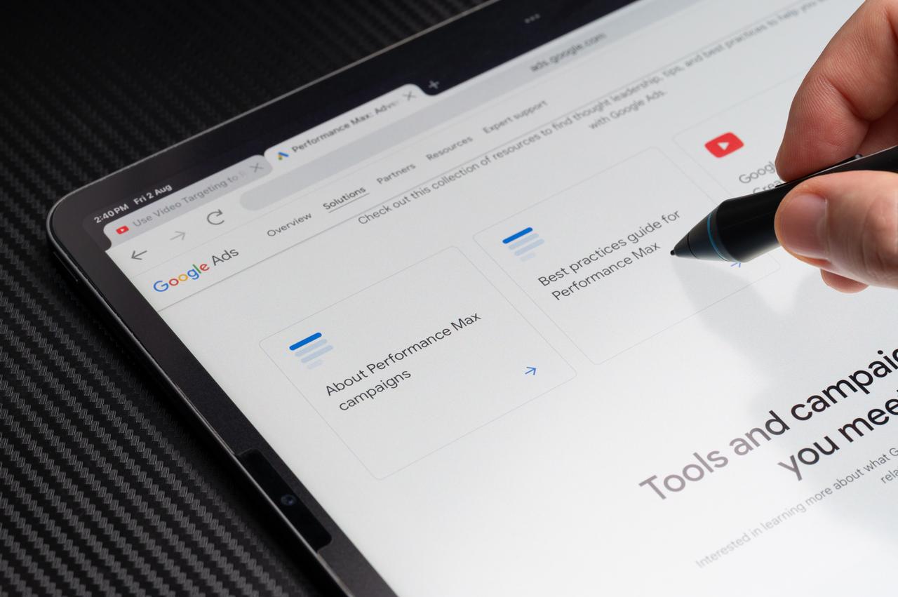 Photo depicts a user interacting with Google Ads dashboard on a tablet, June 20, 2025. (Adobe Stock Photo)
