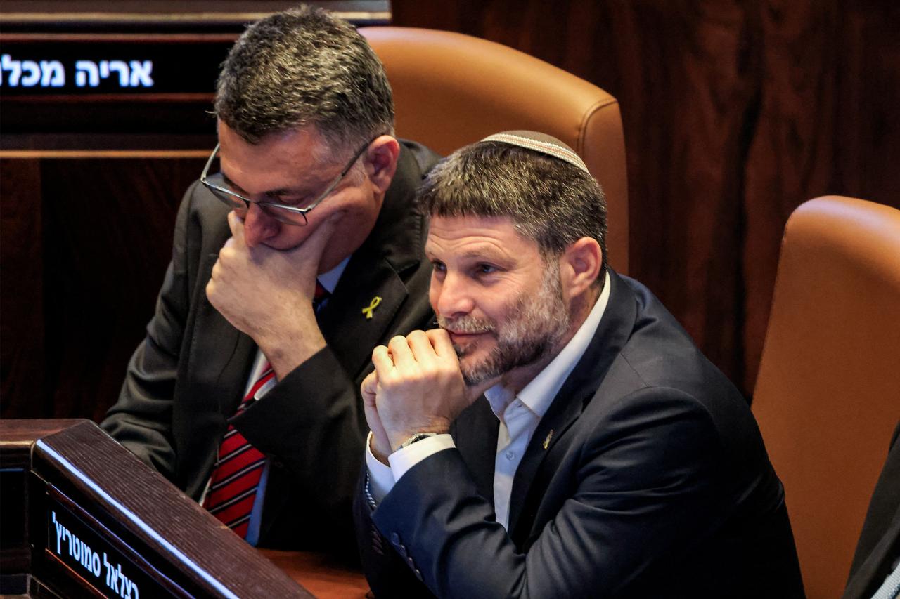 Israels (L to R) Foreign Minister Gideon Saar and Finance Minister Bezalel Smotrich attend the address of Argentinas President to a session of the Israeli parliament (Knesset) at its headquarters in Jerusalem on June 11, 2025. (AFP Photo)