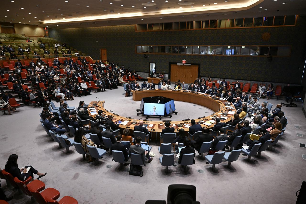 Director General of the International Atomic Energy Agency (IAEA) Rafael Grossi, is seen on a TV screen as he speaks during a United Nations Security Council meeting on the Israel-Iran conflict at the UN headquarters in New York on June 20, 2025. (AFP Photo)