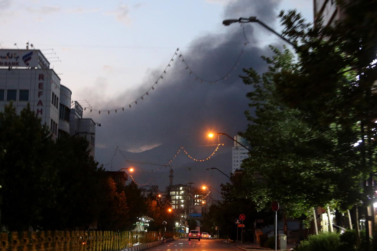 Smoke rises from the area where Israeli forces struck the Iranian state television building in Tehran, Iran on June 16, 2025. (AA Photo)