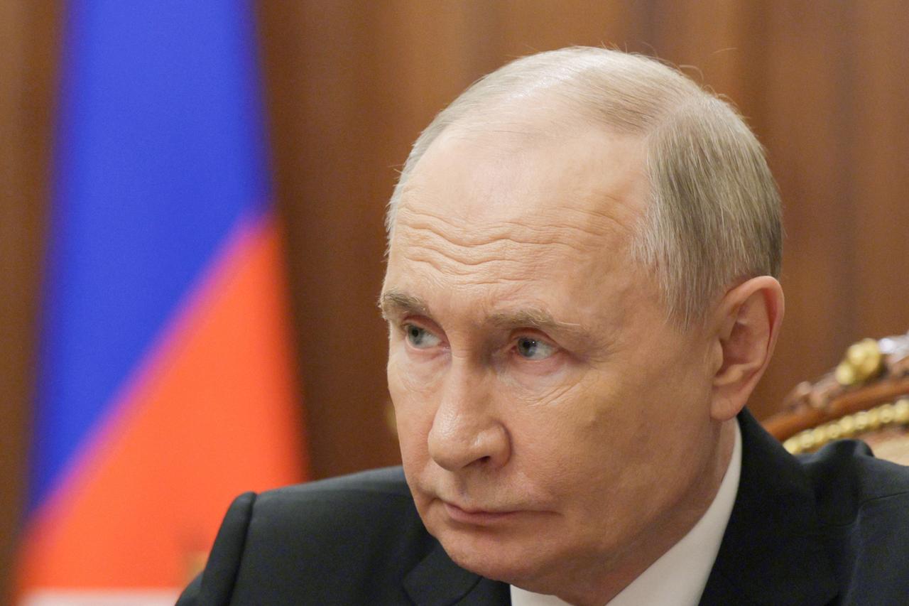 In this pool photograph distributed by Russian state agency Sputnik, Russia's President Vladimir Putin attends a meeting with Russias state-owned defence corporation Rostec CEO in Moscow on June 17, 2025. (AFP Photo)