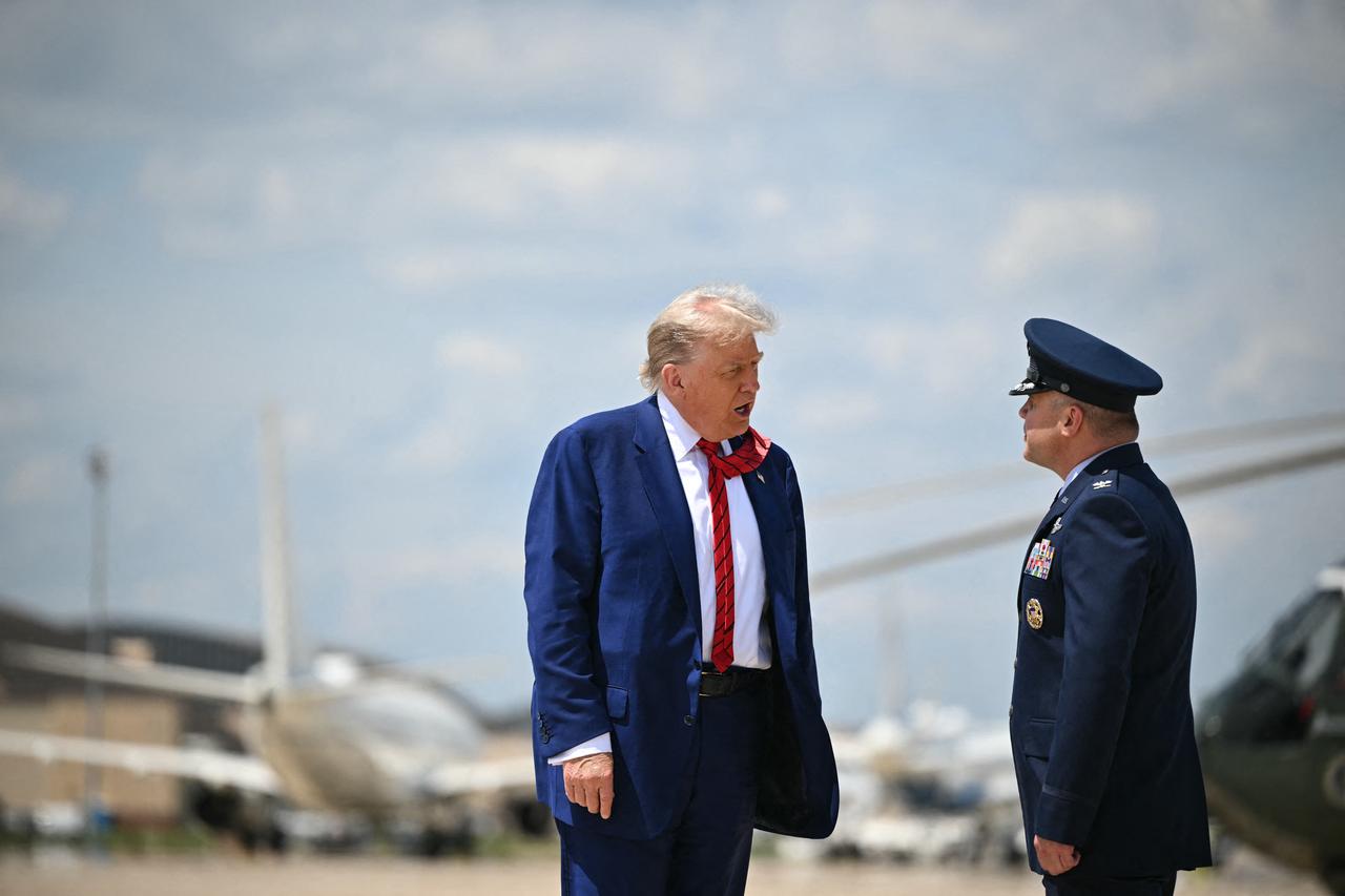 US President Donald Trump makes his way to board Air Force One before departing from Joint Base Andrews in Maryland on June 25, 2025, as he travels to his club in New Jersey. (Photo by Mandel NGAN / AFP)