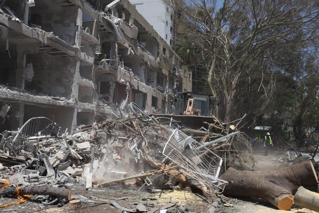 Israeli police and search and rescue teams launch investigation and search operations after one of the missiles fired by Iran in retaliation for Israeli attacks struck Tel Aviv, Israel, on June 21, 2025. (AA Photo)