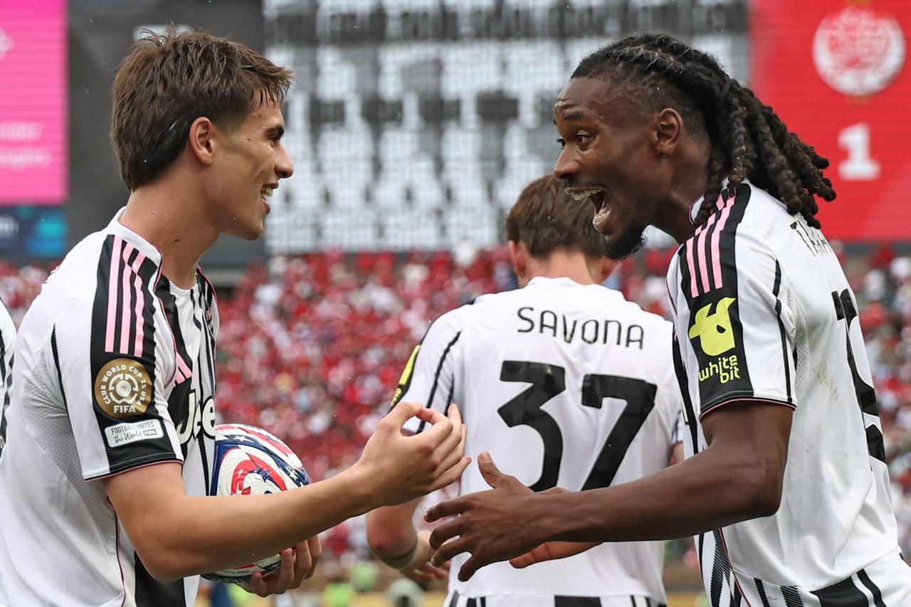 Juventus' Turkish midfielder #10 Kenan Yildiz (L) is congratulated by Juventus' French midfielder #19 Khephren Thuram-Ulien after scoring his team's third goal during the FIFA Club World Cup 2025 Group G football match between Italy's Juventus and Morocco's Wydad AC at the Lincoln Financial Field stadium in Philadelphia on June 22, 2025. (AFP Photo)