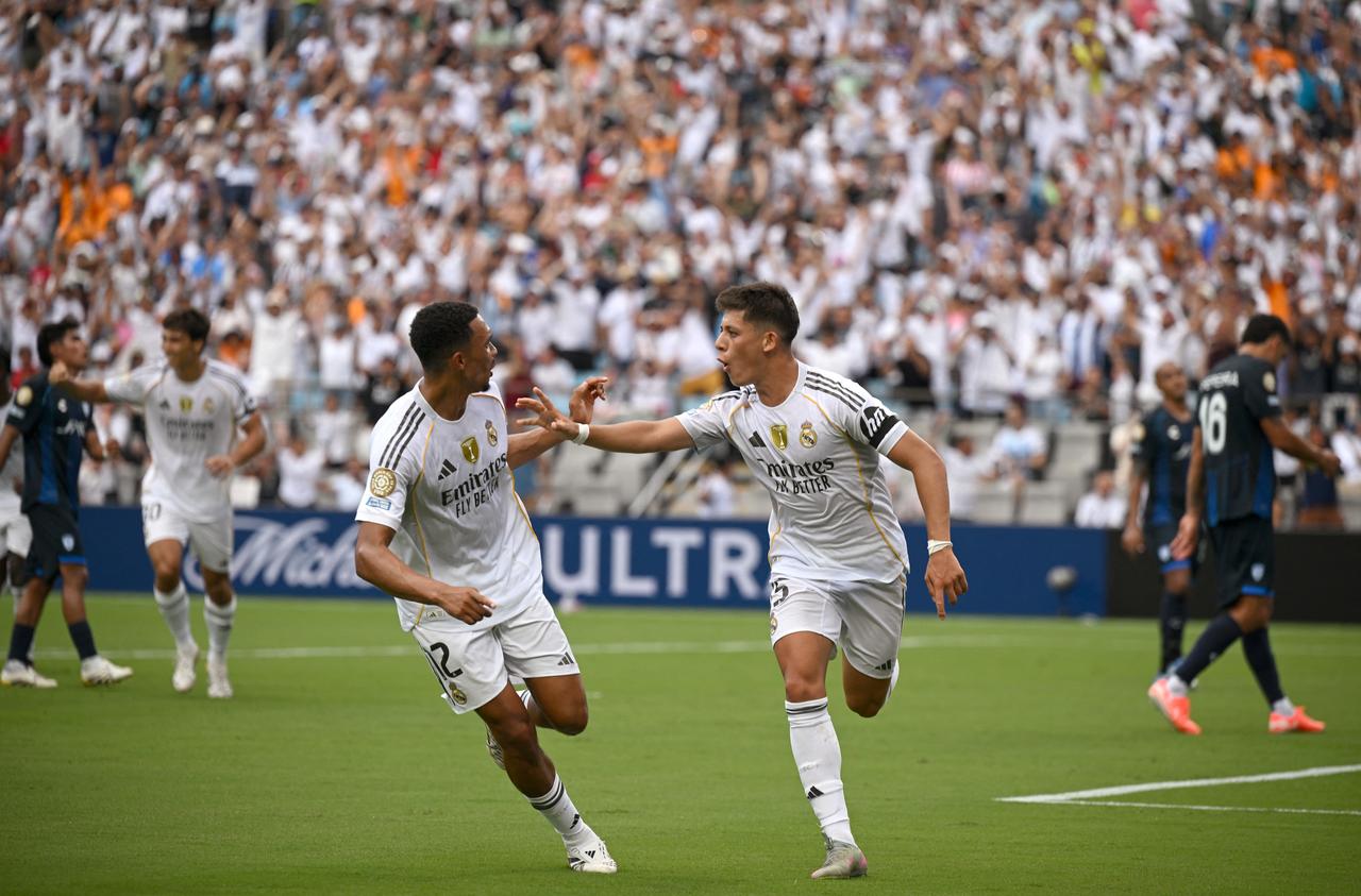 Real Madrid's Turkish midfielder #15 Arda Guler celebrates after scoring his team's second goal with teammate English defender #12 Trent Alexander-Arnold during the FIFA Club World Cup 2025 Group H football match between Spain's Real Madrid and Mexico's Pachuca at the Bank of America stadium in Charlotte on June 22, 2025. (AFP Photo)