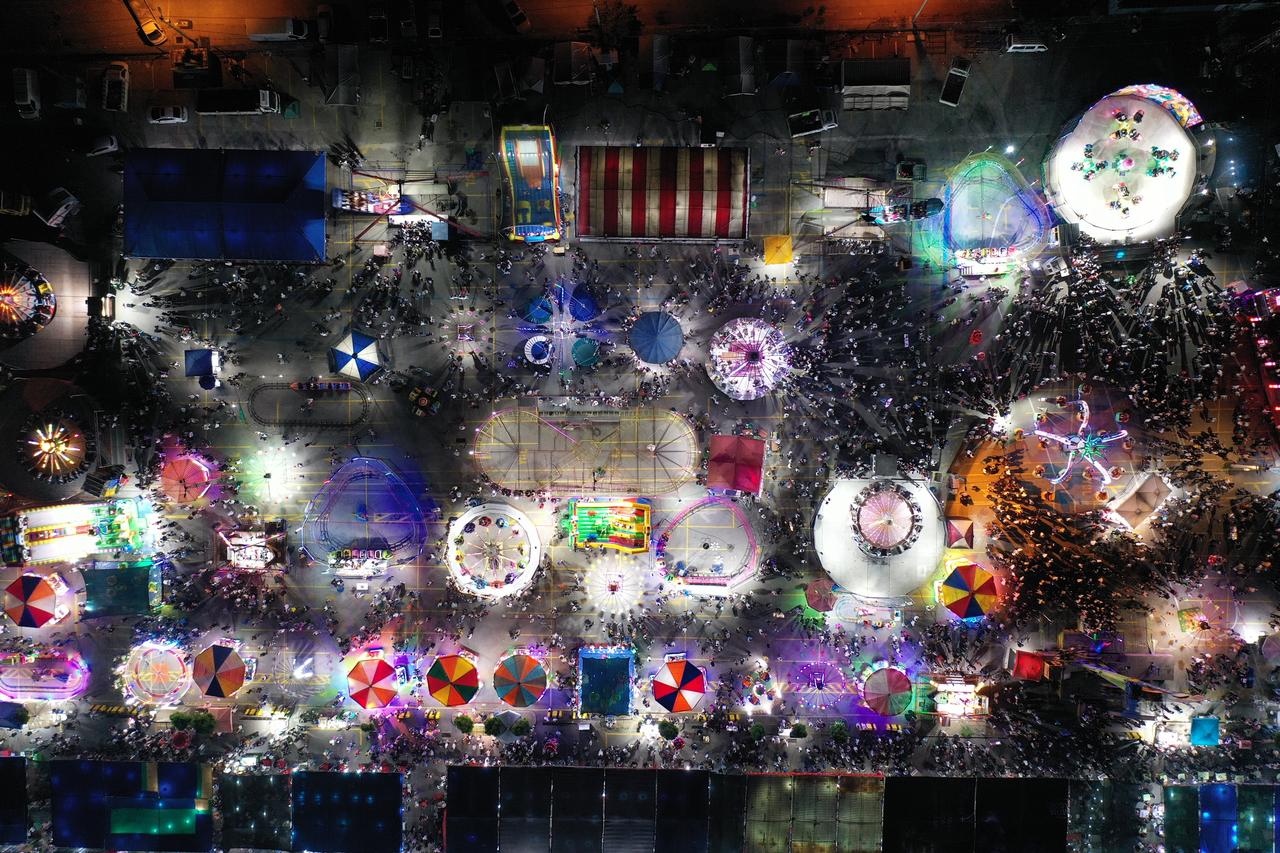 An aerial view of the traditional “Gonen Fair,” held annually for more than half a century in the Gonen district, as it continues to attract thousands of visitors each year, in Balikesir, Türkiye, June 16, 2025. (AA Photo)