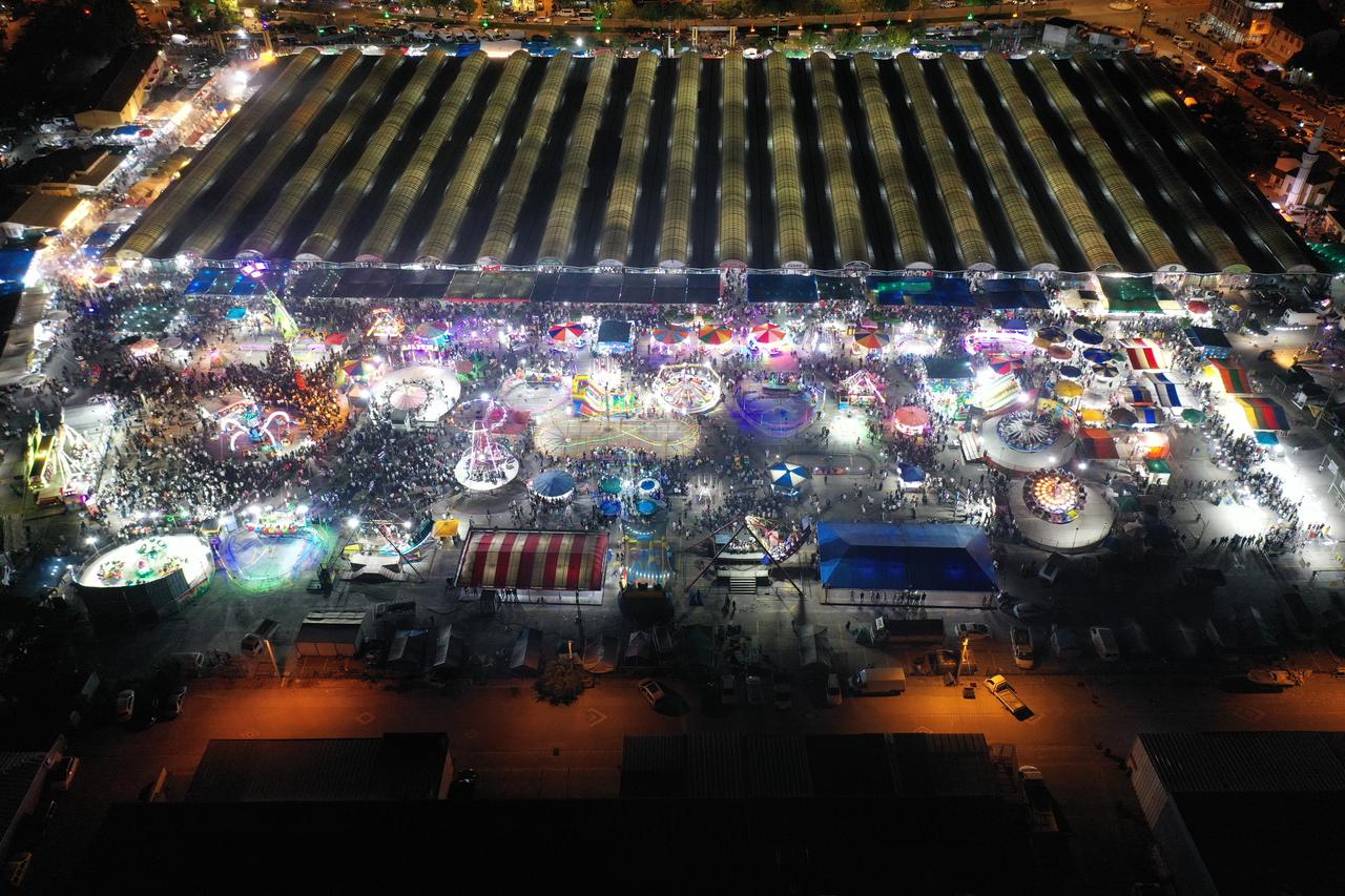An aerial view of the traditional “Gonen Fair,” held annually for more than half a century in the Gonen district, as it continues to attract thousands of visitors each year, in Balikesir, Türkiye, June 16, 2025. (AA Photo)