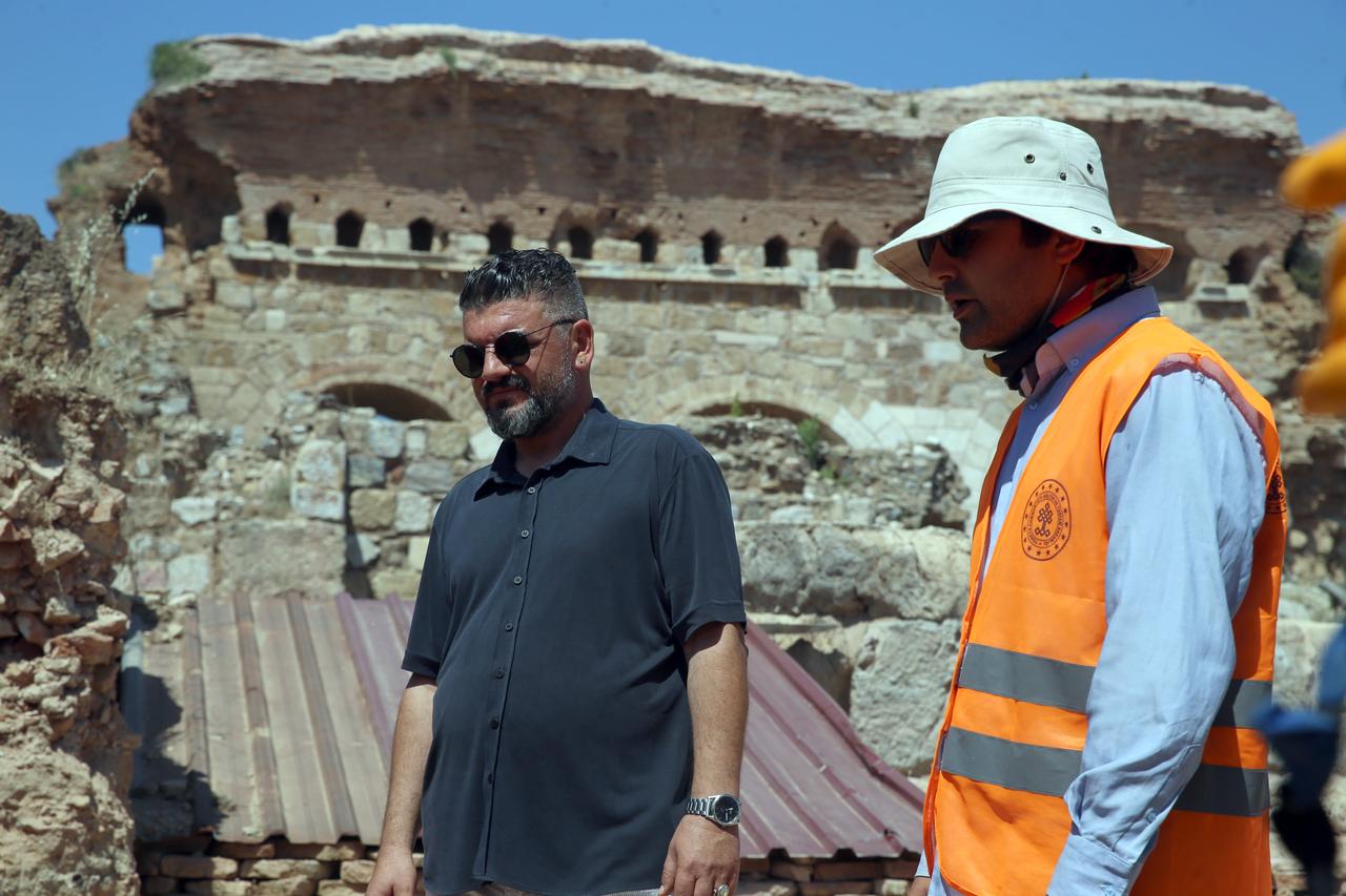 Professor Murat Cekilmez (L), a faculty member at Aydin Adnan Menderes University, has never left the ancient city of Tralleis since first stepping onto the site as an archaeology intern 23 years ago. Over the years, he fulfilled his earliest dream by becoming the head of the excavation team, Aydin, Türkiye, June 23, 2025. (AA Photo)
