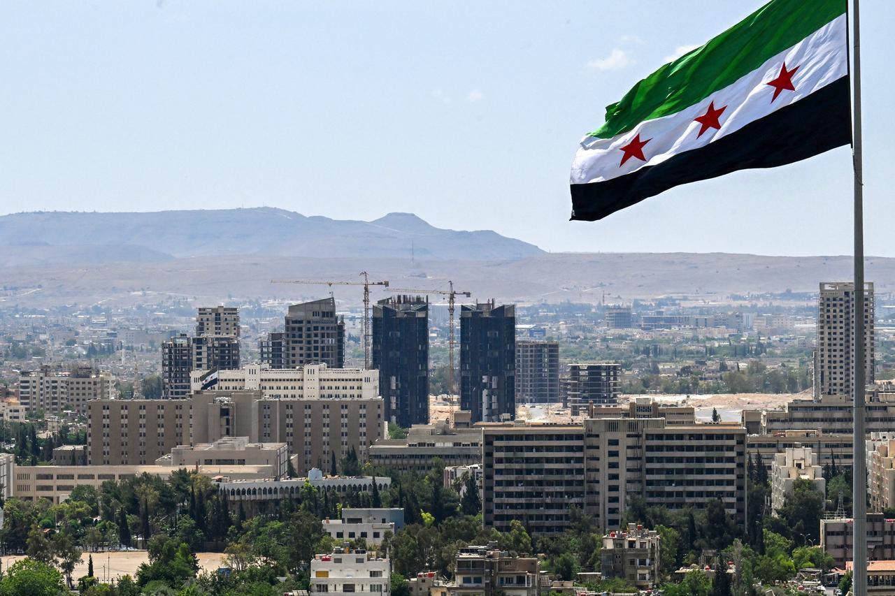 A large Syrian flag flutters above Tishreen Park in Damascus, Syria on June 4, 2025. (AFP Photo)