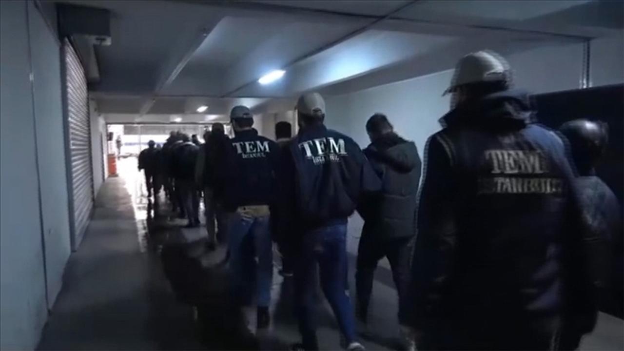Suspects detained as part of an investigation into Israeli Mossad's activities in Türkiye escorted by polic in Istanbul, Türkiye on Jan. 4, 2024. (AA Photo)