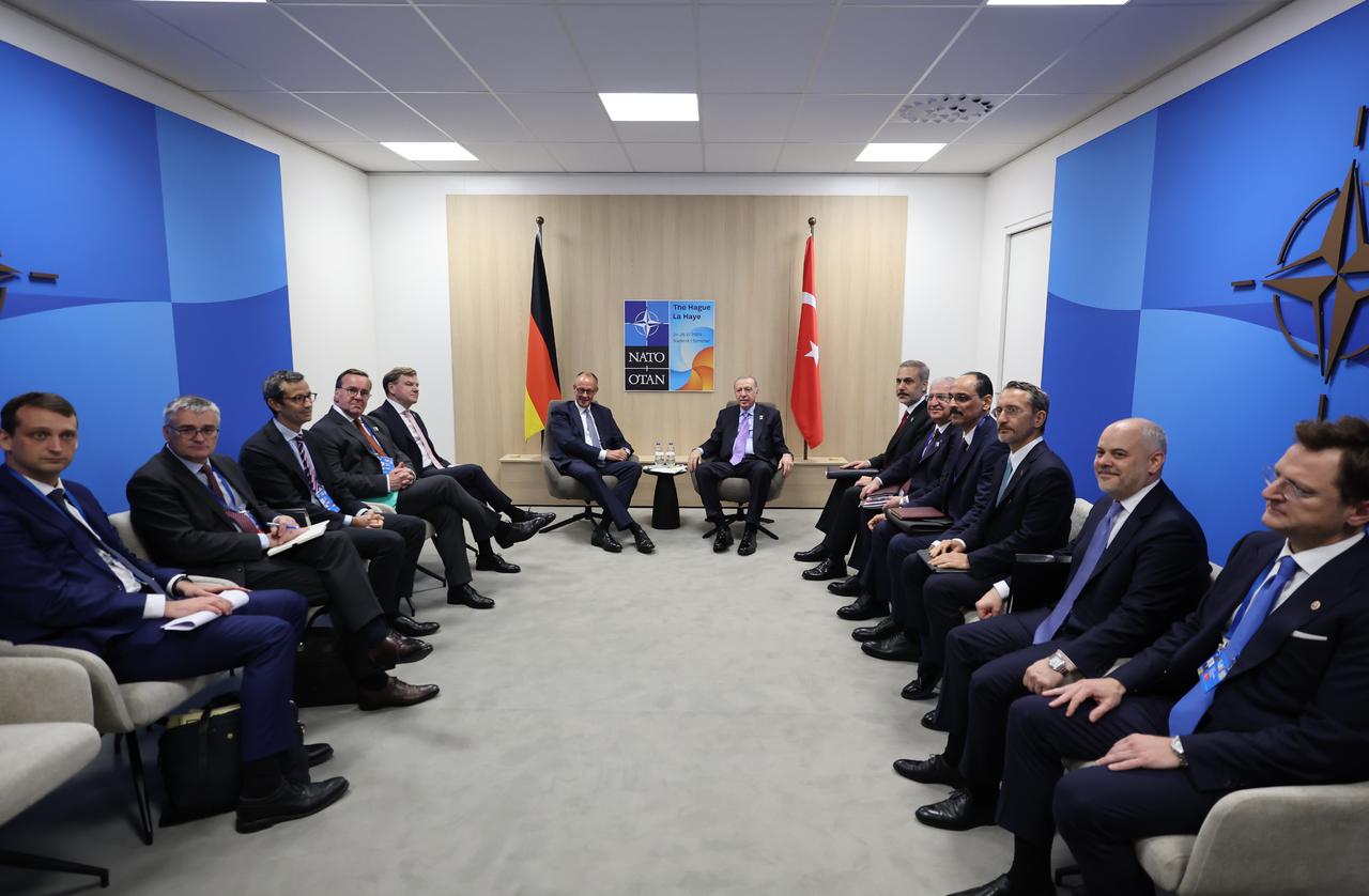 President Recep Tayyip Erdogan (C-R) meets with German Chancellor Friedrich Merz (C-L) as part of the NATO Heads of State and Government Summit in The Hague, Netherlands on June 25, 2025. (TUR Presidency/Murat Cetinmuhurdar - Anadolu Agency)