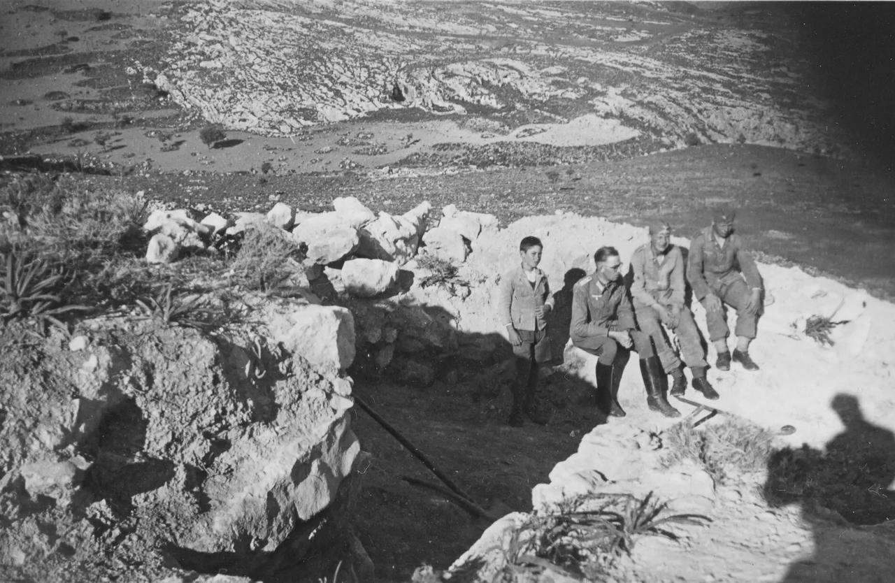 August Schorgendorfer, the Austrian archaeologist and German officer, second from left, during the excavation of a Minoan ruin, Tholos Tomb A, on Crete in 1941. (Photo via August Schorgendorfer photo album)