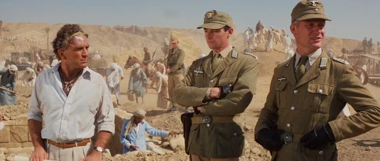 Nazi soldiers digging in Egypt in a scene from "Raiders of the Lost Ark". (Photo via Lucasfilm Ltd.)