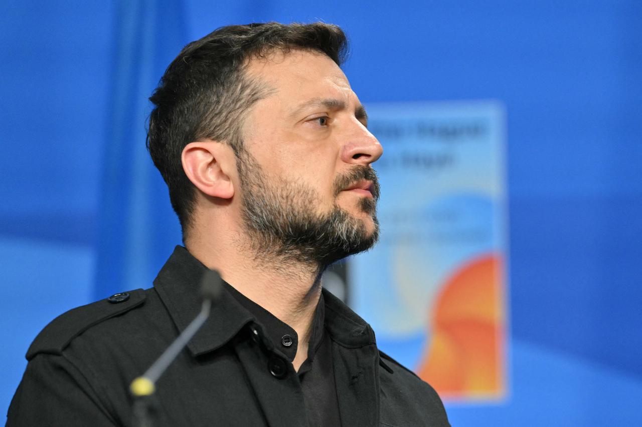 Ukraine's President Volodymyr Zelenskyy reacts during a NATO summit in The Hague on June 24, 2025. (AFP Photo)