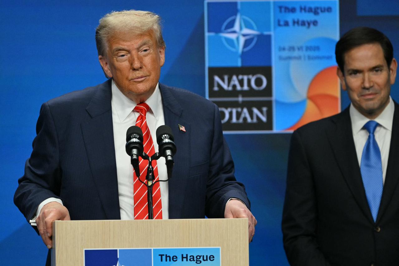 US Secretary of State Marco Rubio (R) listens as US President Donald Trump addresses a press conference during a North Atlantic Treaty Organization (NATO) Heads of State and Government summit in The Hague on June 25, 2025. (AFP Photo)