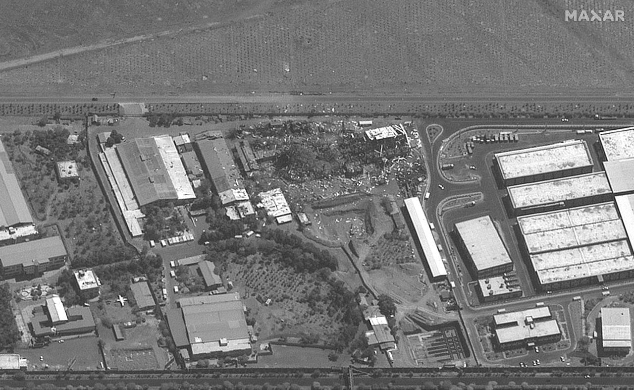 This handout satellite picture provided by Maxar Technologies shows destroyed buildings adjacent to Mehrabad International Airport in Tehran on June 24, 2025. (Photo by Satellite image ©2025 Maxar Technologies / AFP)