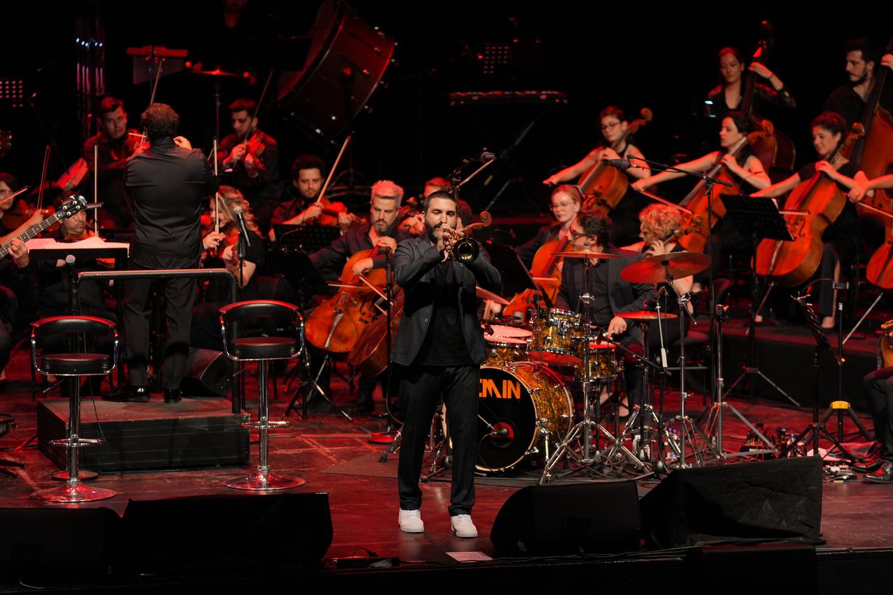 World-renowned instrumentalist Ibrahim Maalouf performed a concert accompanied by a symphony orchestra at the Harbiye Cemil Topuzlu Open-Air Theatre, Istanbul, Türkiye, June 24, 2025. (AA Photo)