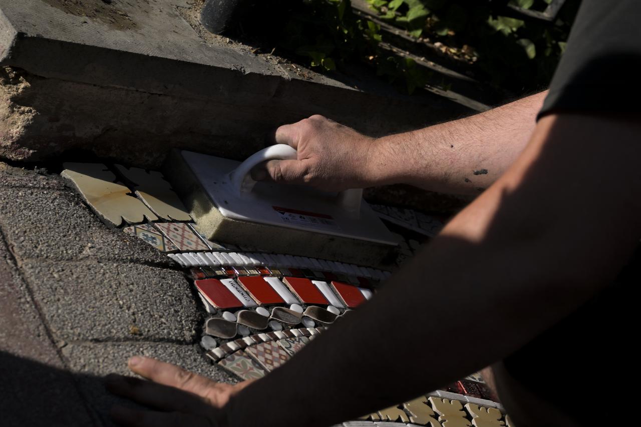 Famed French anonymous street artist Ememem created a mosaic installation on a sidewalk along Paris Street, where the French Embassy in Ankara is located, Türkiye, June 25, 2025. (AA Photo)