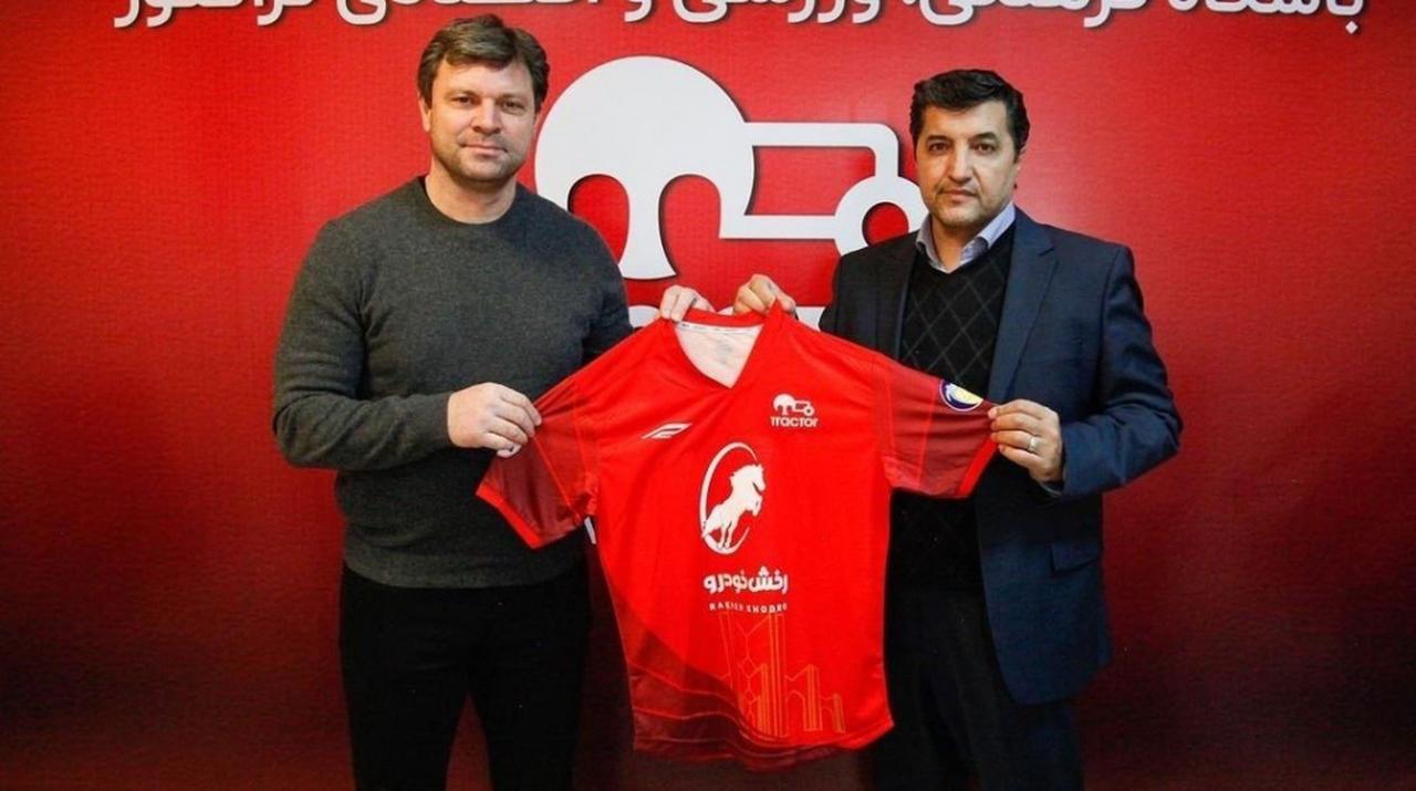 Prominent Turkish head coach Ertugrul Saglam posing at a signing ceremony wearing Tractor FC jersey, Tabriz, Iran, February 28, 2022. (@TractorOfficial via X)
