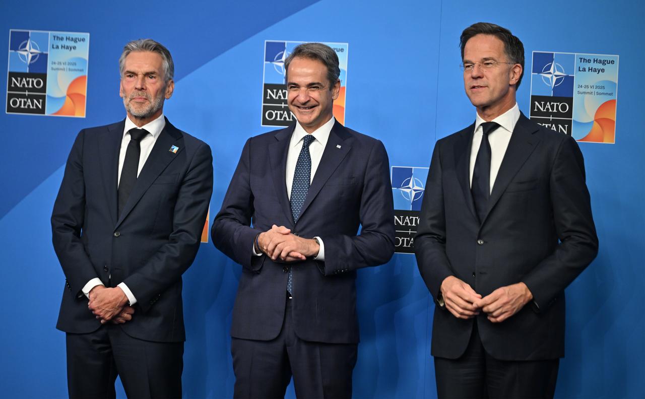 Greek Prime Minister Kyriakos Mitsotakis (C) is welcomed by NATO Secretary General Mark Rutte (R) and Dutch Prime Minister Dick Schoof (L) at the NATO Heads of State and Government Summit in The Hague, Netherlands on June 25, 2025. (AA Photo)