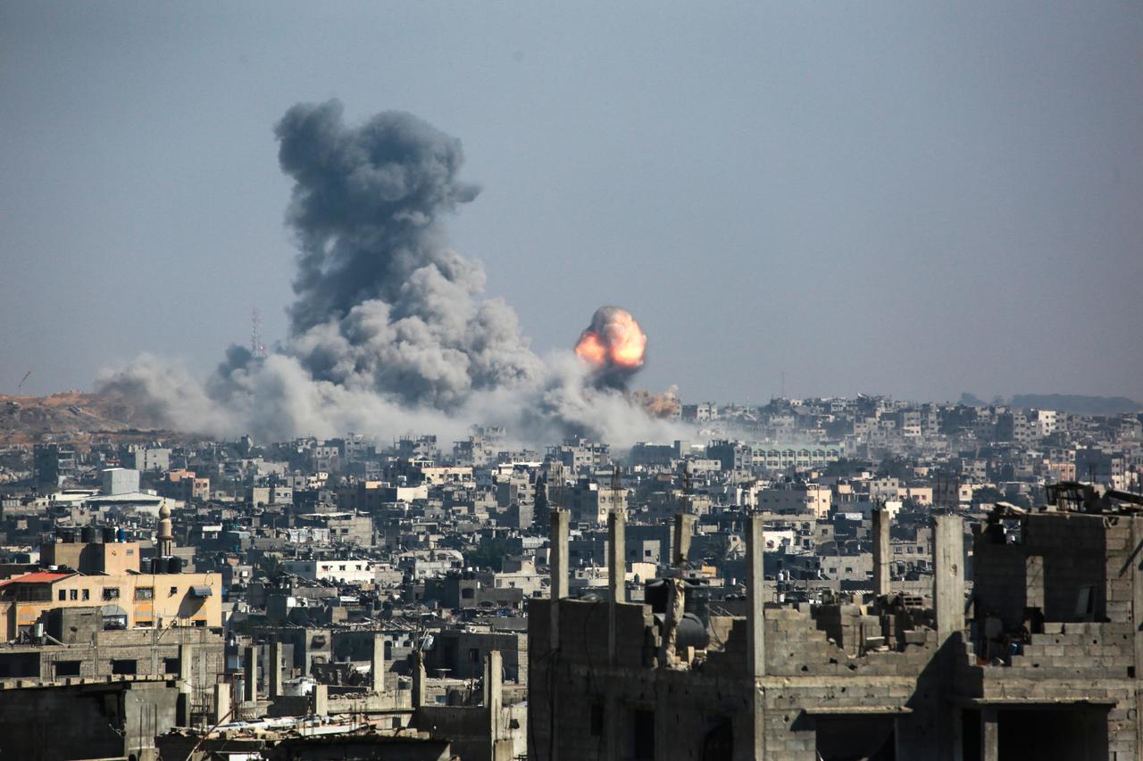 A column of fire and smoke erupts following Israeli bombardment of areas east of the Tuffah neighbourhood in eastern Gaza City on June 18, 2025. (AFP Photo)