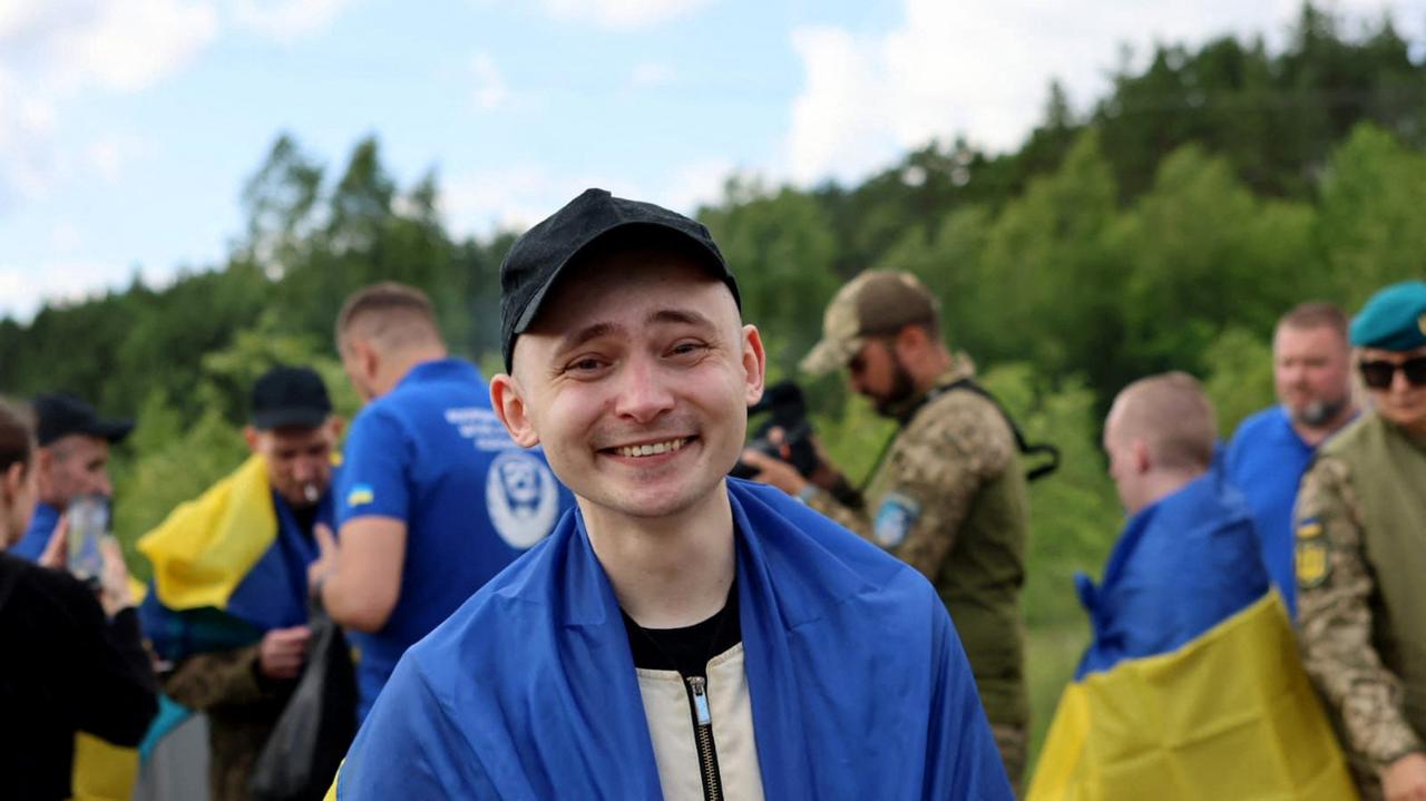 This handout photograph taken and released on June 26, 2025 by Coordination Headquarters for the Treatment of Prisoners of War, shows a Ukrainian serviceman reacting after his exchange in an undisclosed place of Ukraine, amid Russian invision in Ukraine. (Photo by Handout / COORDINATION HEADQUARTERS FOR THE TREATMENT OF PRISONERS OF WAR / AFP)