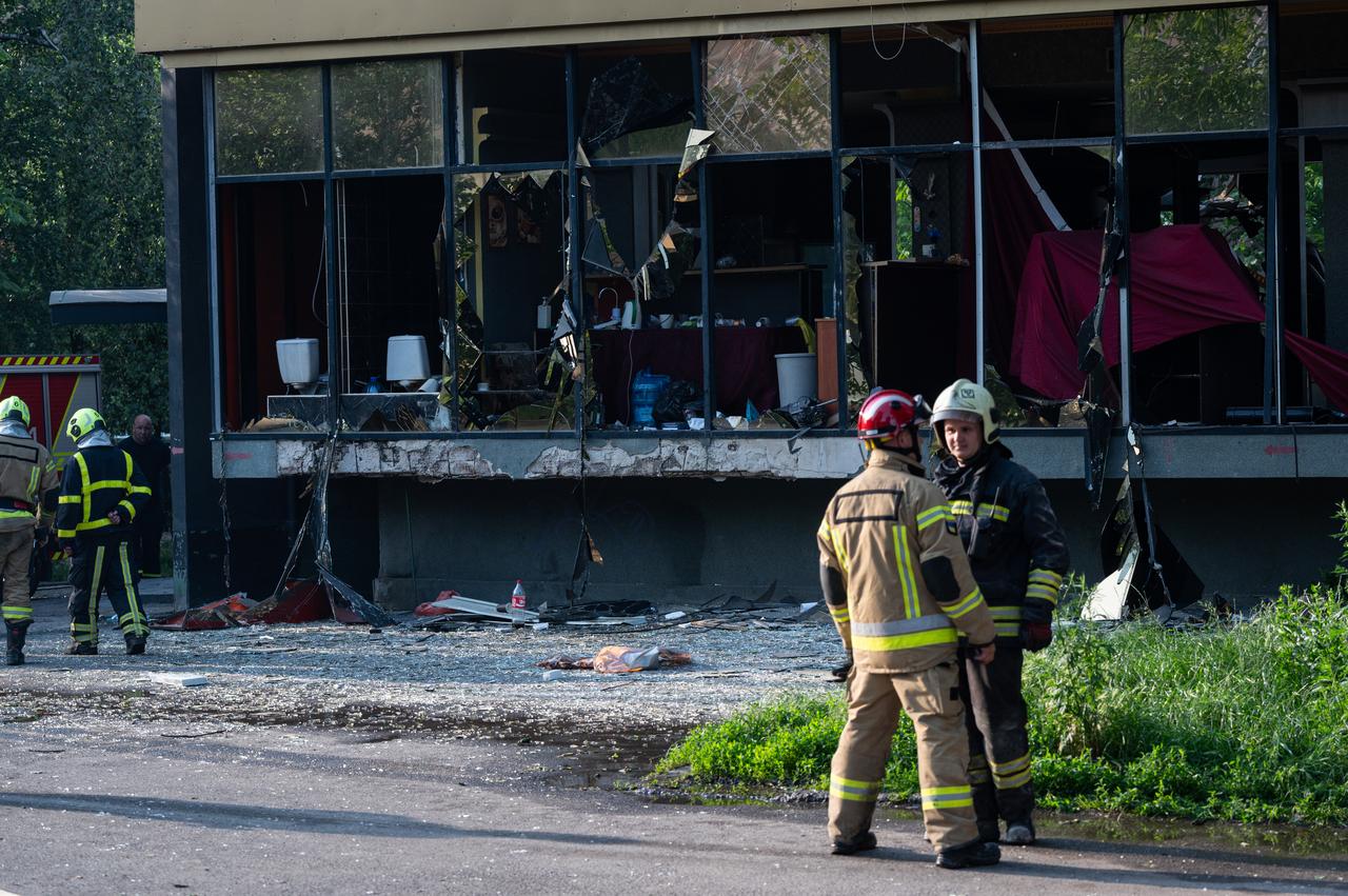 Emergency workers are seen at the site of a Russian attack in Kyiv, Ukraine on June 17, 2025. (AA Photo)