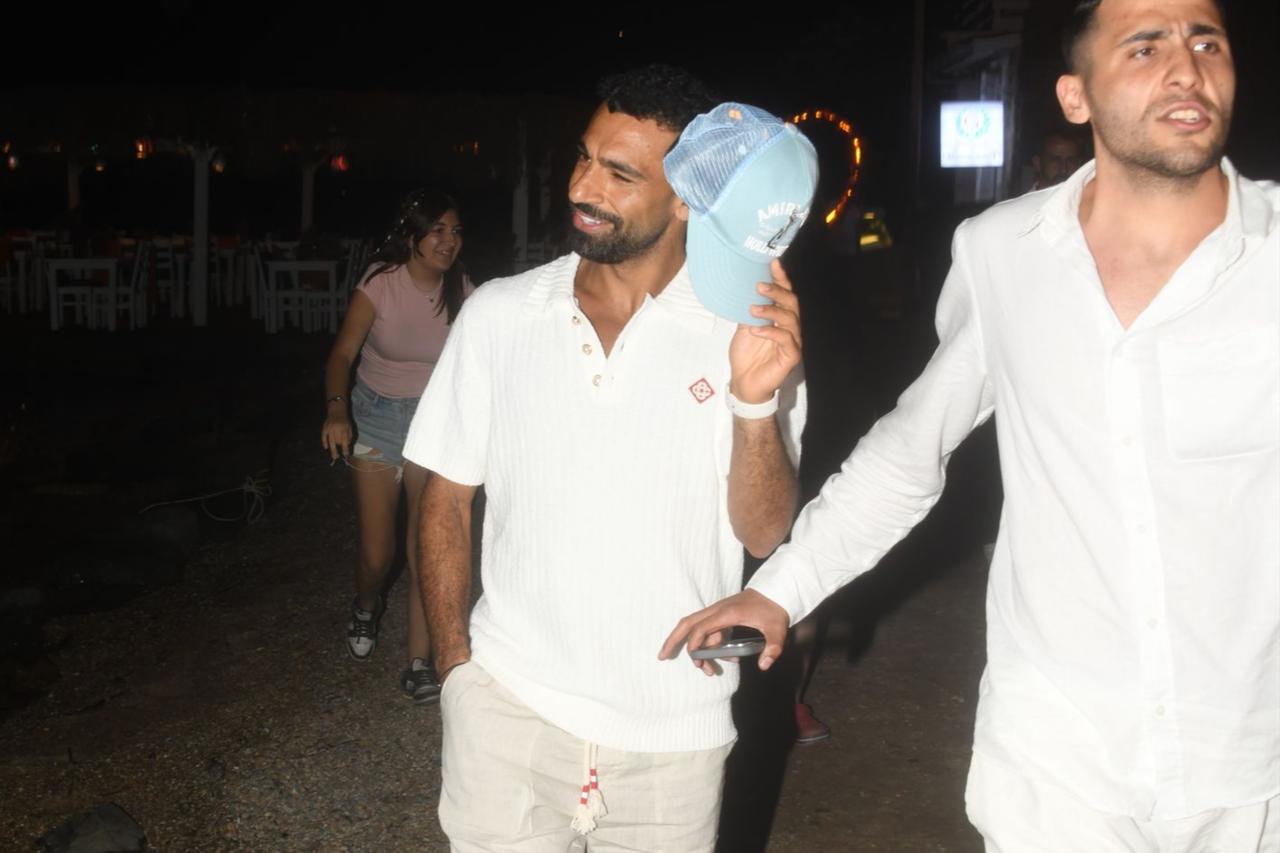 Famous footballer Mohamed Salah (L) was photographed by journalists as he left a seafood restaurant in Bodrum, Mugla, Türkiye, June 26, 2025. (Photo via Haberturk)