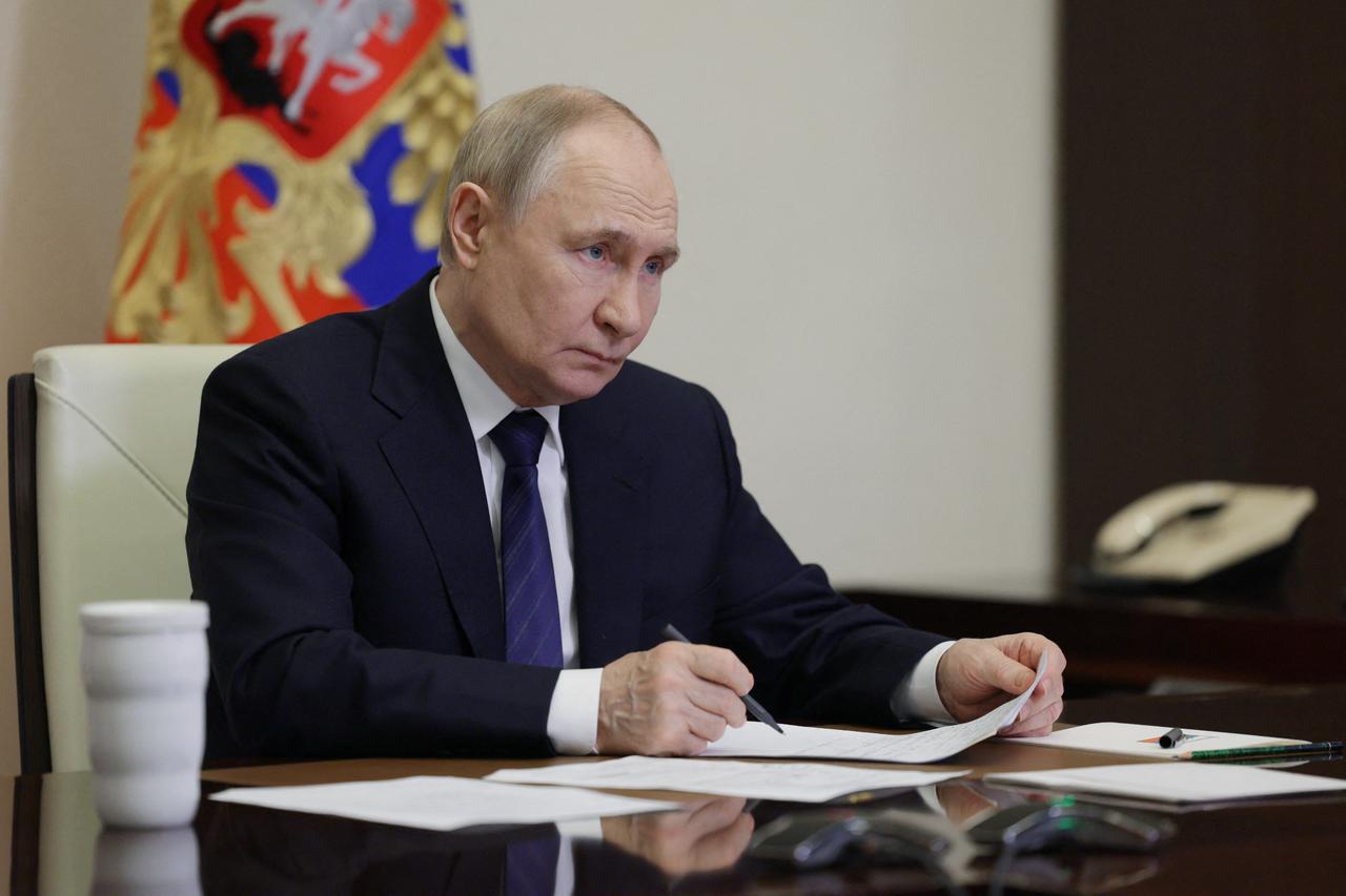 In this pool photograph distributed by the Russian state agency Sputnik, Russias President Vladimir Putin chairs a meeting on educational and museum complexes via a videoconference at the Novo-Ogaryovo state residence outside Moscow on June 25, 2025. (AFP Photo)