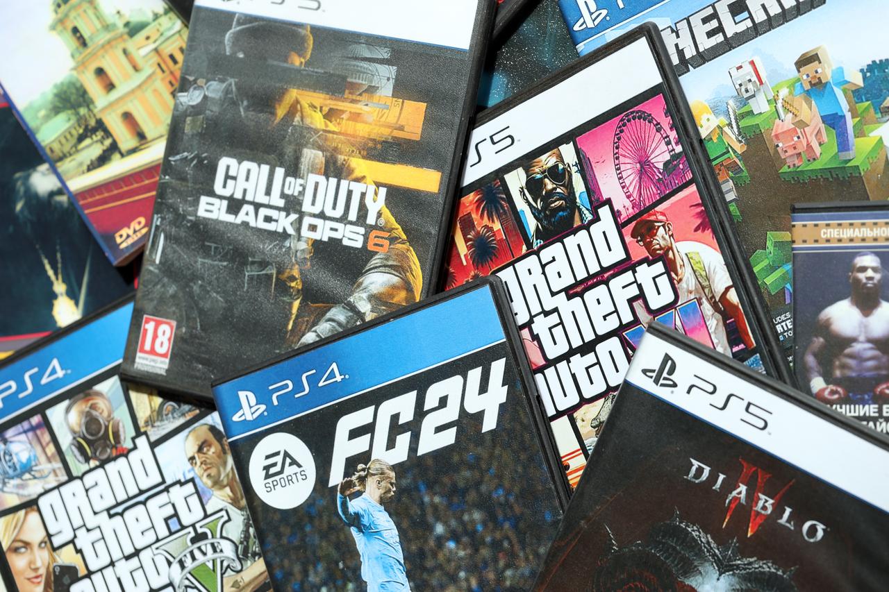 Stack of video games for Sony Playstation 5 and 4 console on Kyiv, Ukraine in Jun 26, 2024. (Adobe Stock Photo)